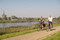 Cycling along the river dyke at Kampen