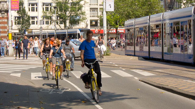 A group of cyclists on a guided bike tour in Amsterdam. Photo © Holland-Cycling.com
