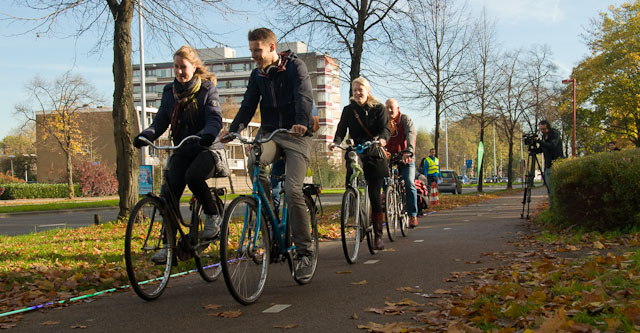 Cyclists following the green Light Companion. Photo © Holland-Cycling.com
