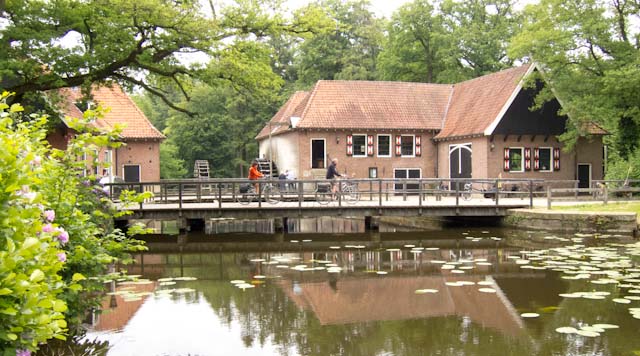 Cycling past the watermills of the Singraven Estate. Photo © Holland-Cycling.com