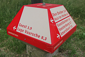 Toadstool shaped signpost for cyclists. Photo © Holland-Cycling.com